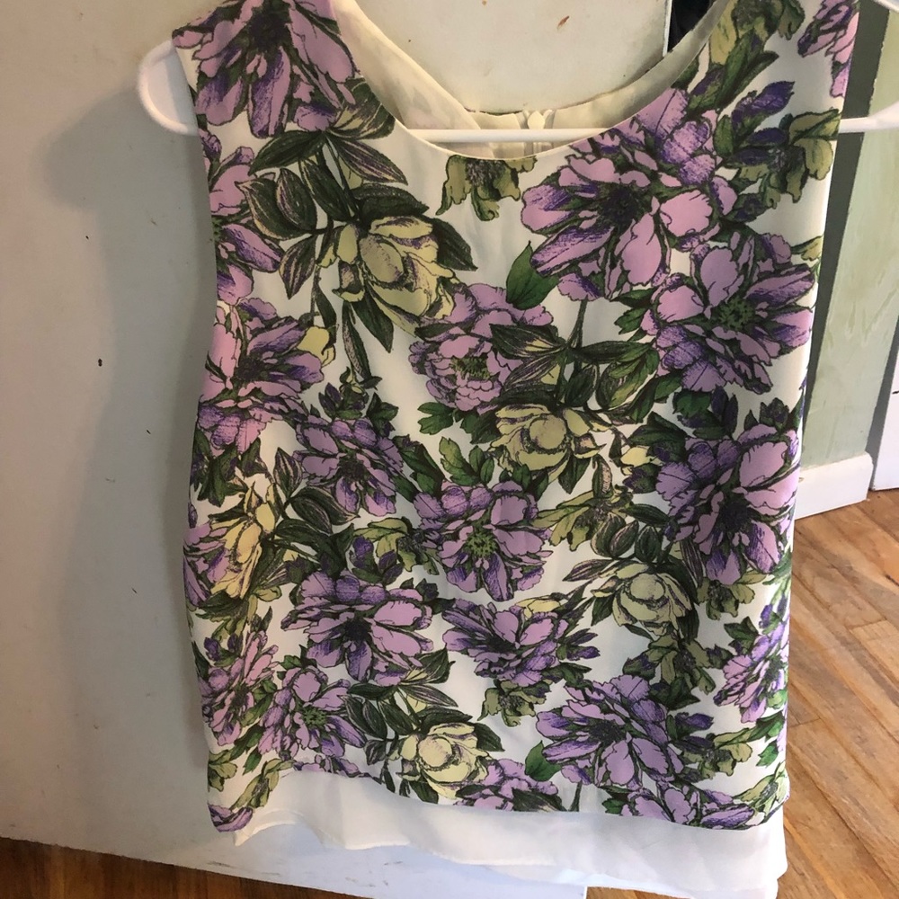 Scoop neck zip back sleeveless shirt